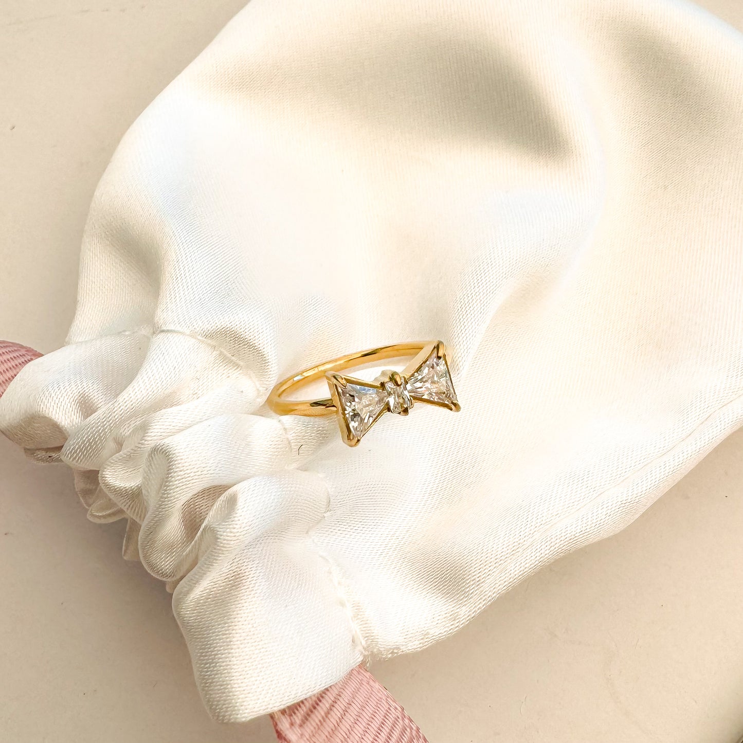 white bow cz ring