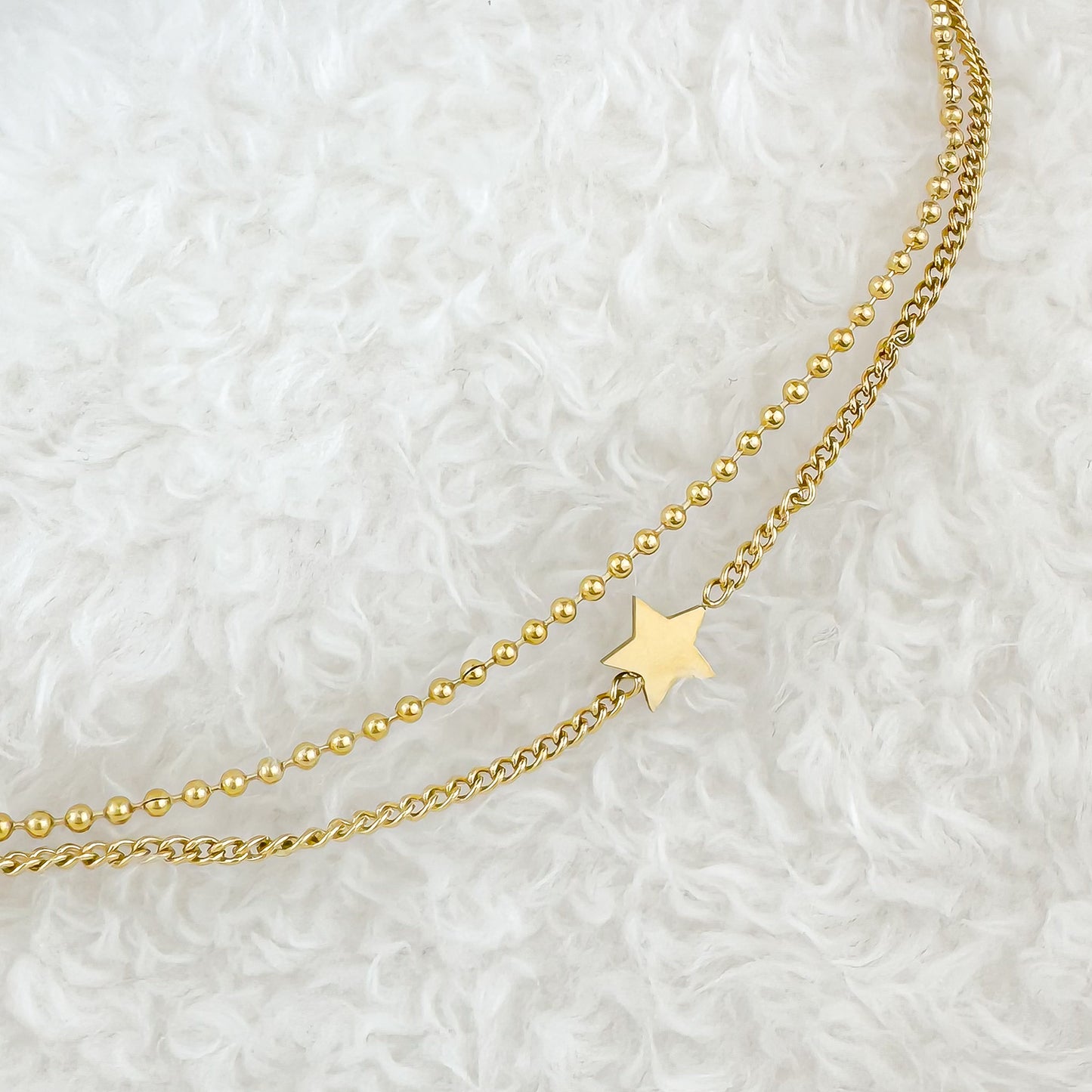 Arden gold double chain bracelet with star