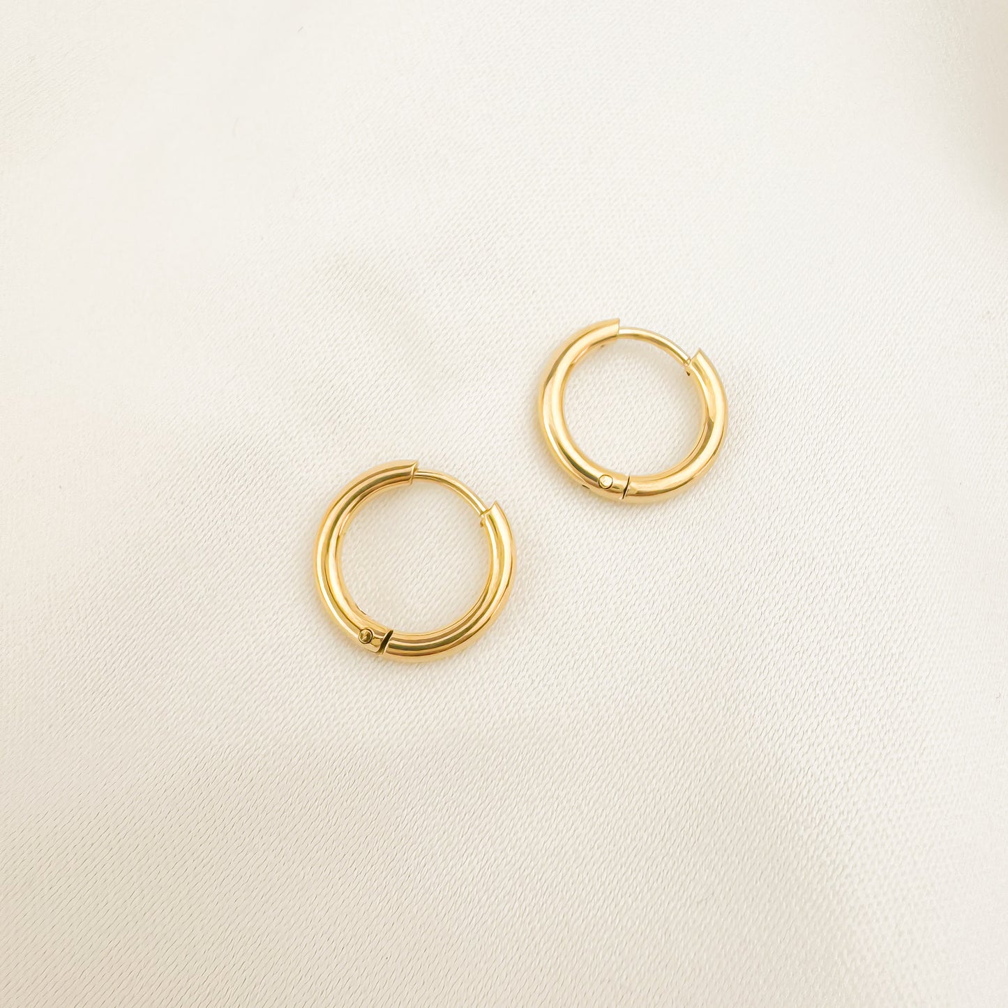 Bailey 10mm gold huggies earrings