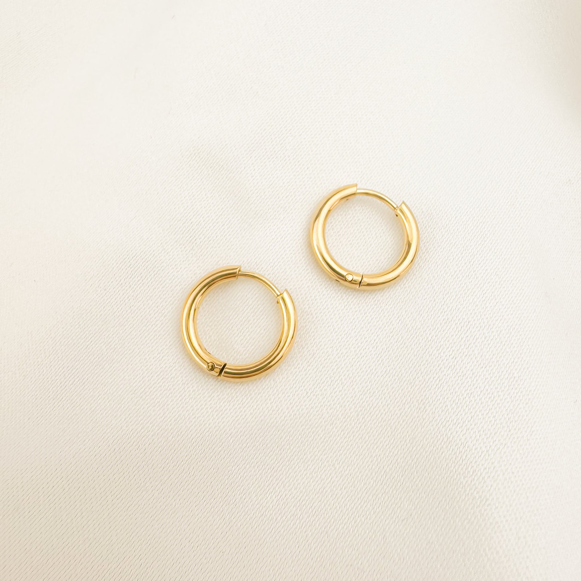 Bailey 10mm gold huggies earrings