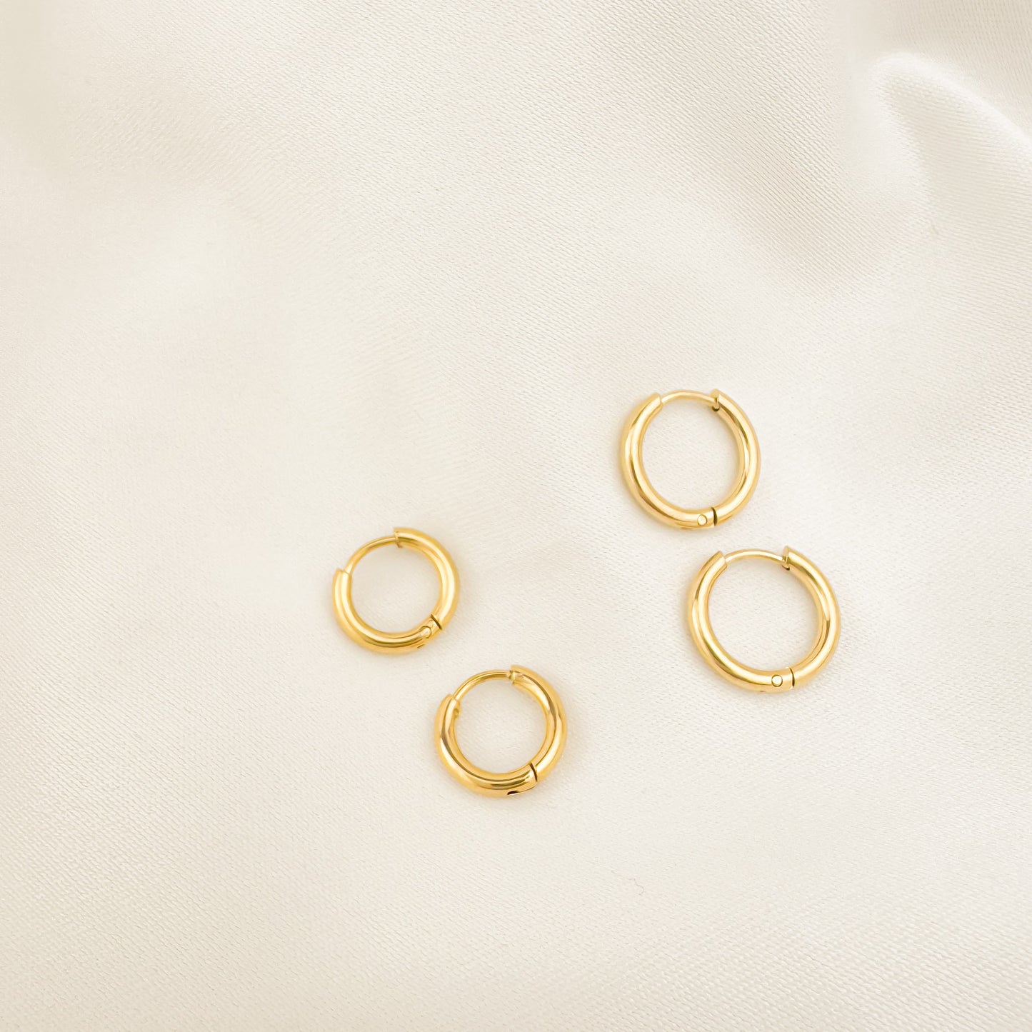 Bailey 8mm and 10mm gold huggies earrings