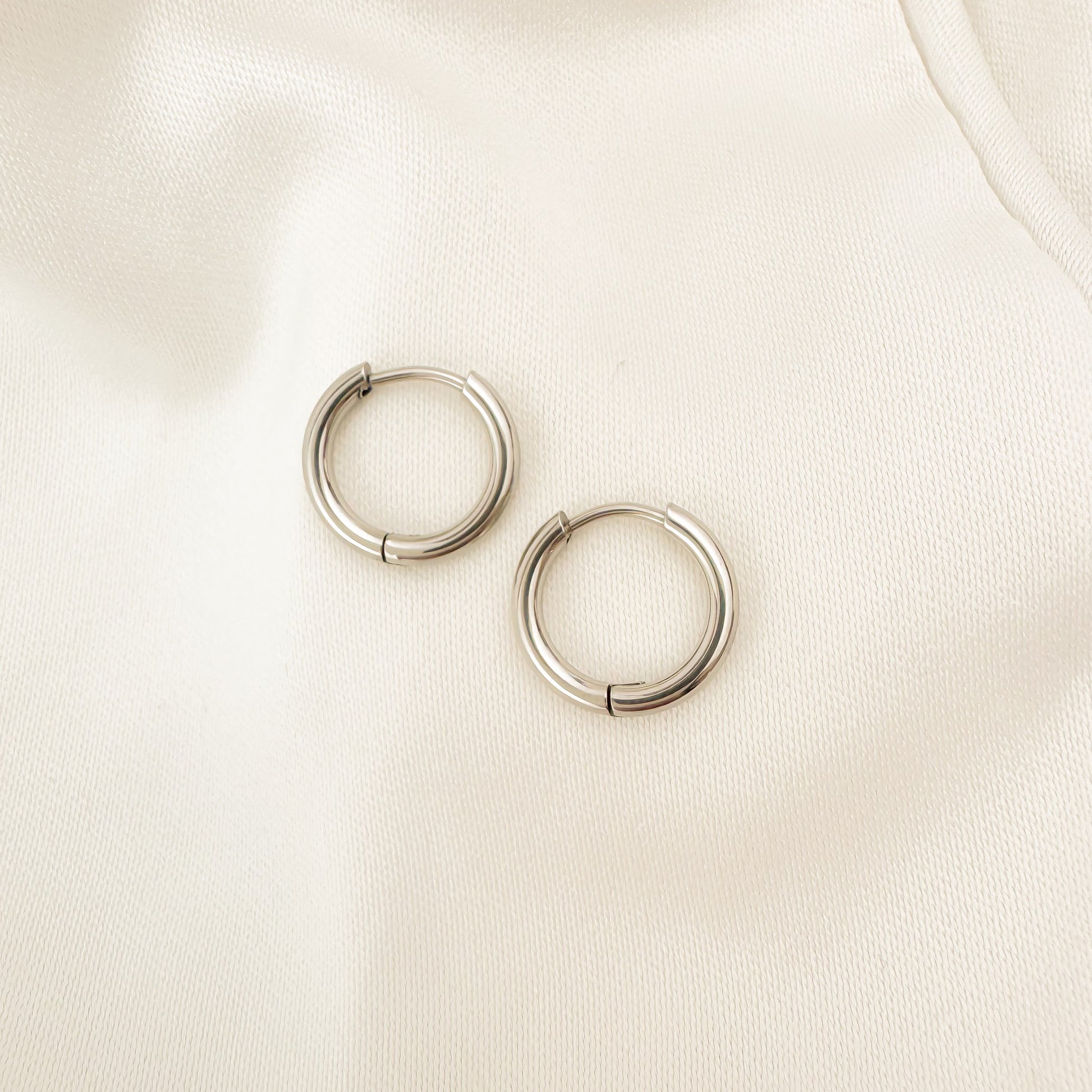 Bailey 10mm silver huggies earrings