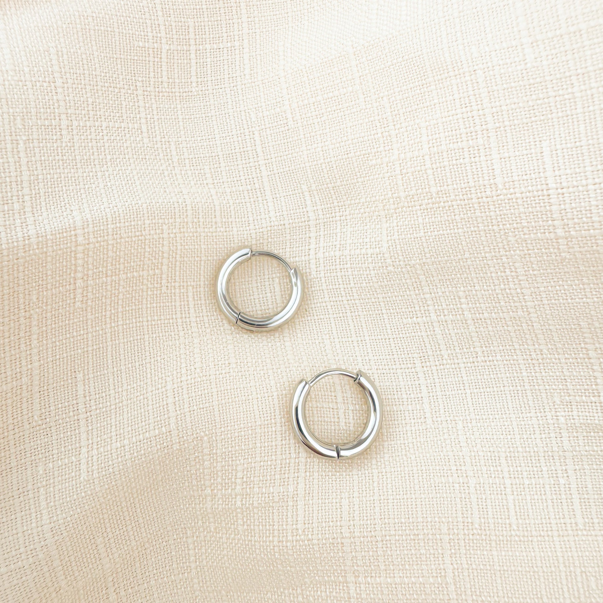 Bailey 8mm silver huggies earrings