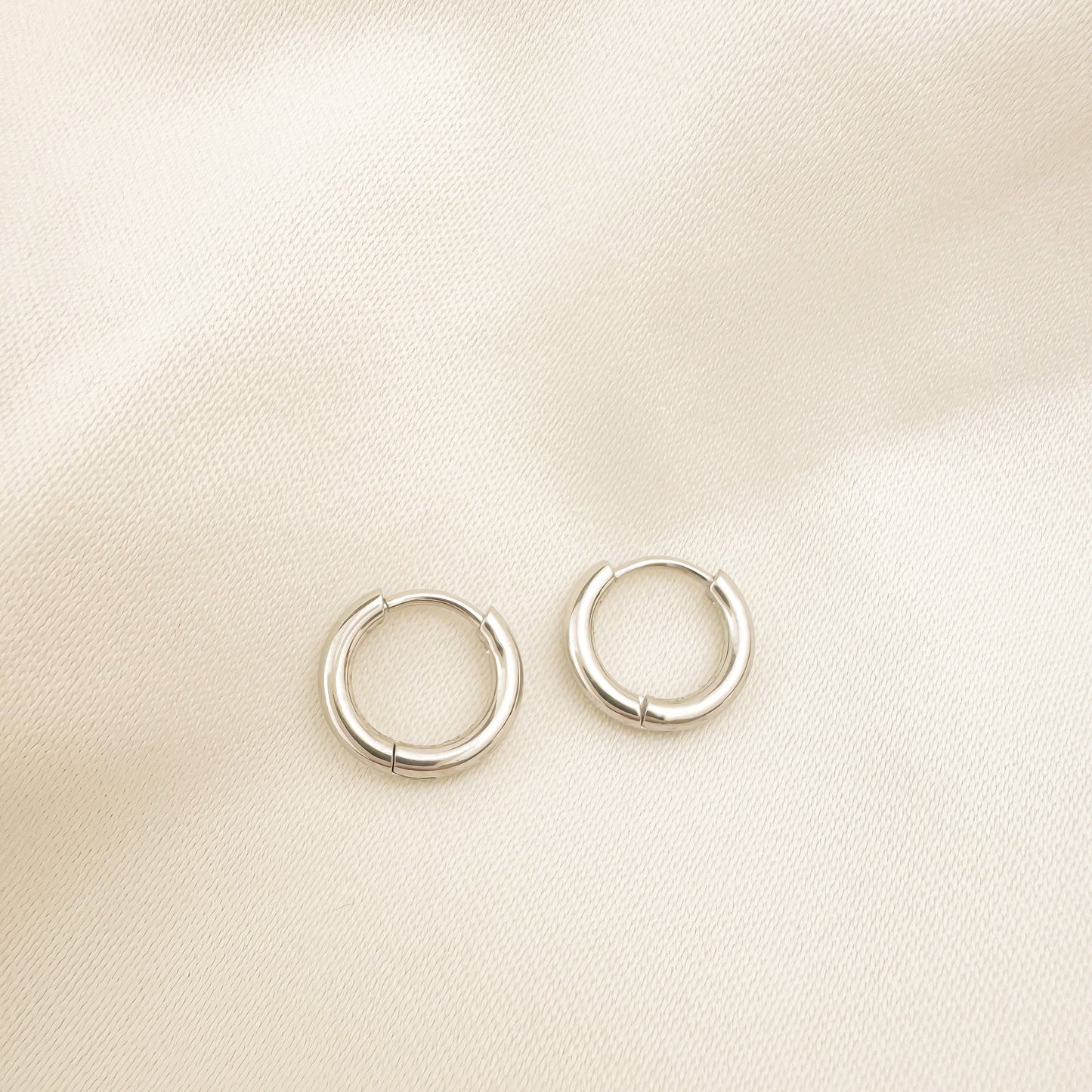 Bailey 8mm silver huggies earrings