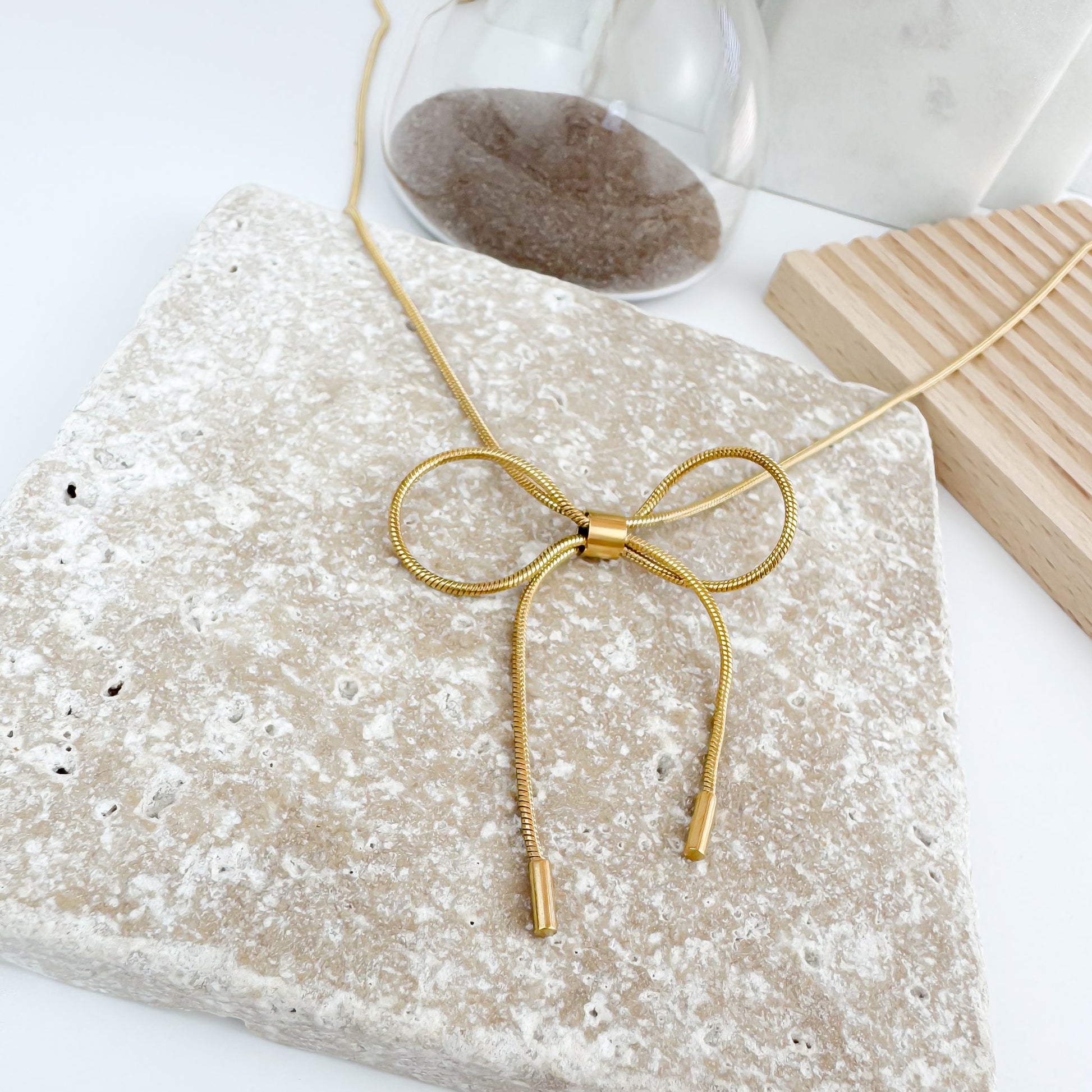 gold harmony bow tie necklace