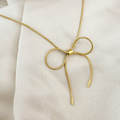 gold harmony bow tie necklace